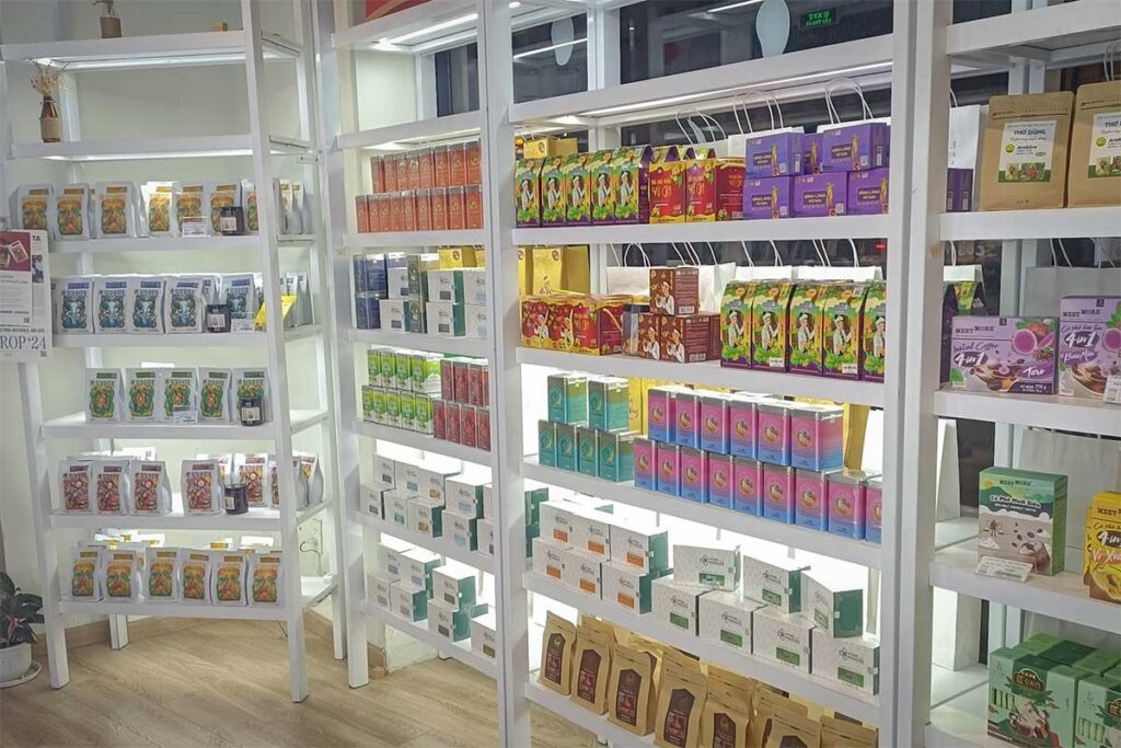 Packaged tea herbal products and local snack souvenirs displayed inside a modern specialty store in Phu Quoc