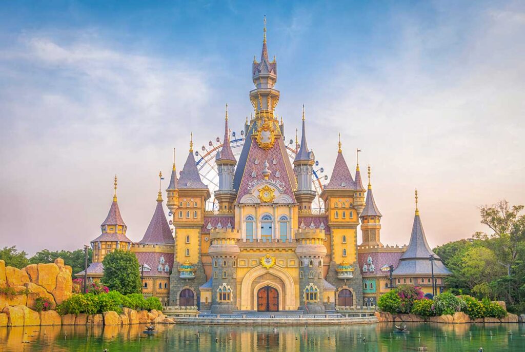 Fairy tale castle at VinWonders Phu Quoc surrounded by water and colorful towers in northern Phu Quoc
