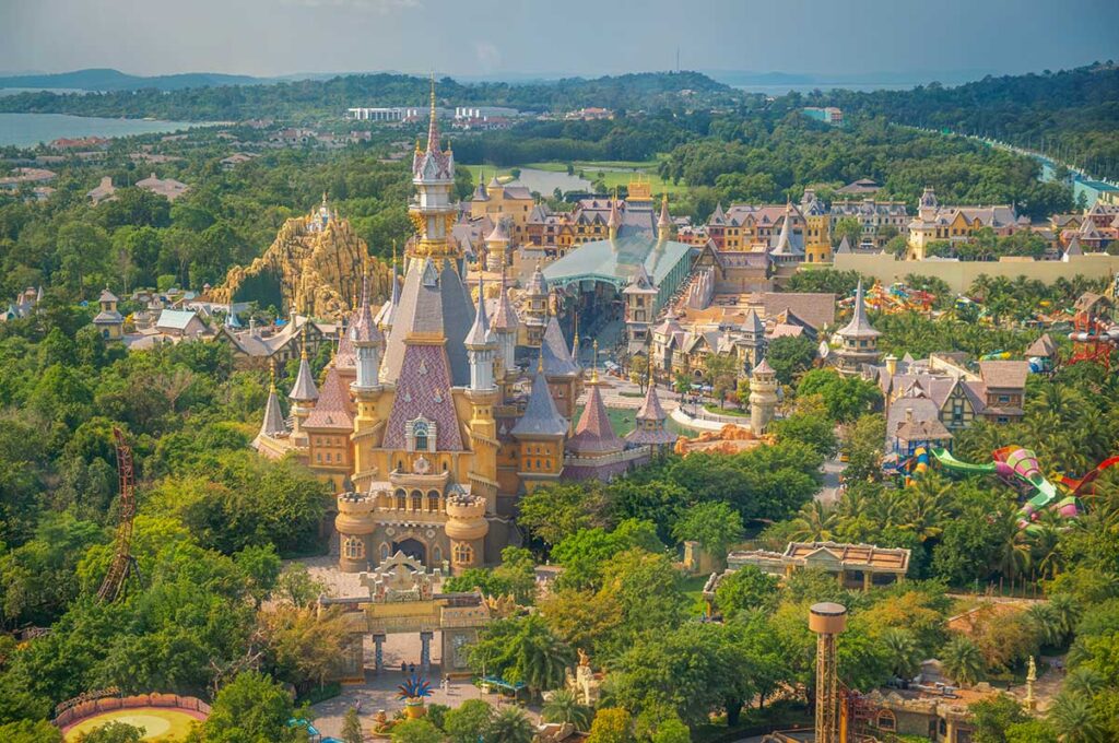 Aerial drone view of VinWonders Phu Quoc showing castle themed attractions water park and entertainment zones