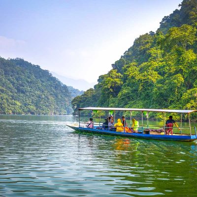 Tourists doing a boat tour over Ba Be Lake