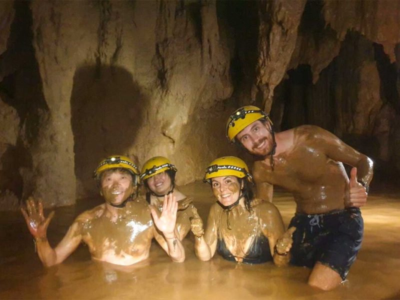 backpackers dark cave phong nha 1 A group of backpackers in Vietnam are Dark Cave, part of Phong Nha completly covered in mud as the complete cave is made of mud