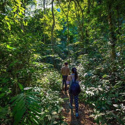 Two tourist doing a trekking in Cat Ba National Park