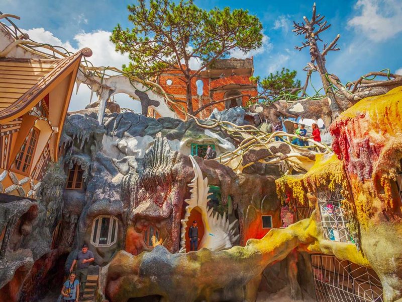 Fairytale structures at Crazy House Dalat with surreal architecture, organic shapes, and winding walkways