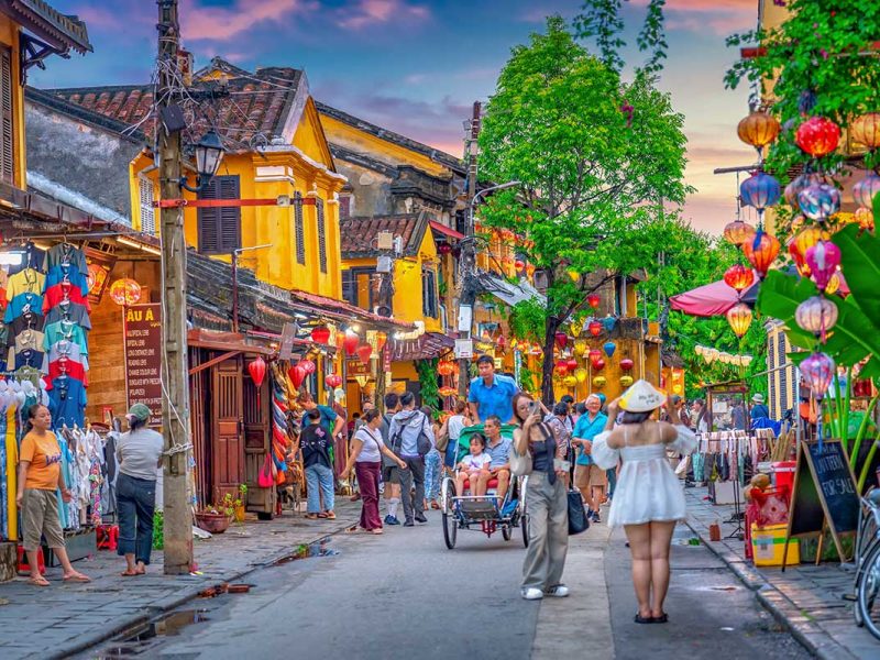 Lantern-filled streets and yellow heritage houses in Hoi An Ancient Town – one of the best things to do in Vietnam.