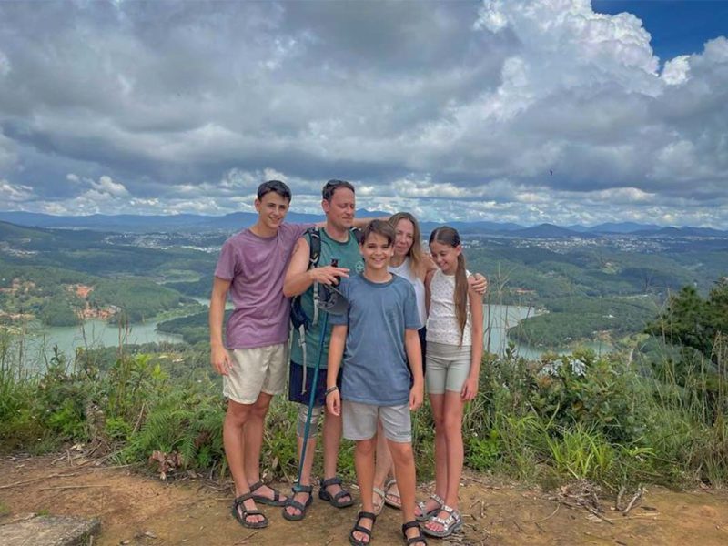 Family on a short trek around Tuyen Lam Lake near Dalat enjoying nature and easy walking paths