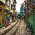 View of a train track running down a residential neighborhood of Hanoi, now called Hanoi Train Street