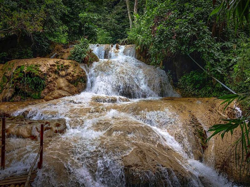 Stream of the Hieu Waterfall surrounded by forest