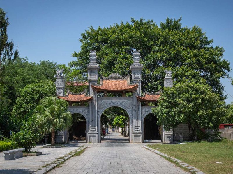 hoa lu ancient capital 2 Stone gateway of Dinh Tien Hoang Temple opening onto the courtyard, shaded by trees, Hoa Lu Ancient Capital, Ninh Binh