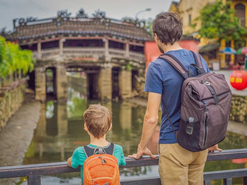Hoi An with kids – father and son visiting the Japanese Covered Bridge in Hoi An Ancient Town
