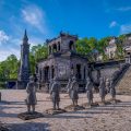 Khai Dinh Tomb tours featuring detailed stone architecture and royal guardian statues in Hue