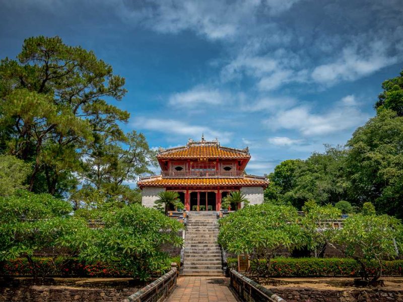Stone path over water leading to one of the main halls of Minh Mang Tomb