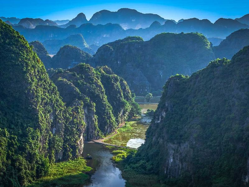 Viewpoint over Tam Coc and river seen from Mua Cave in Ninh Binh
