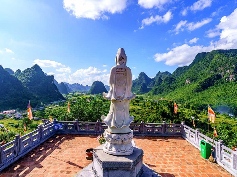 A statue located on the hill top of Phat Tich Truc Lam Ban Gioc Pagoda with amazing views over the surrounding mountains of Cao Bang