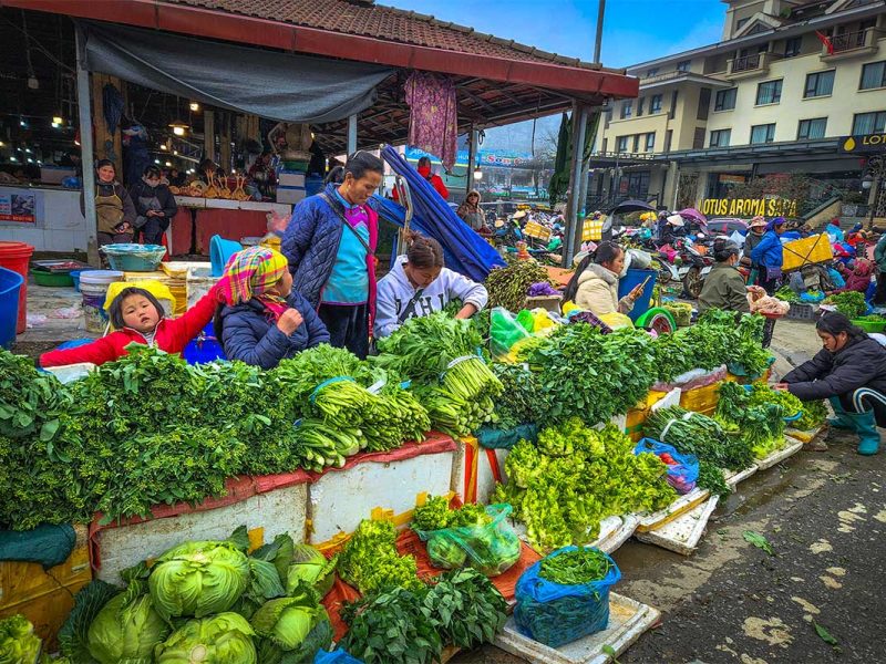 Vegetables being sold at a stall outside at the Sapa Market