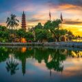 Tran Quoc Pagoda at Dawn: Golden sunlight bathes the Tran Quoc Pagoda in Hanoi at dawn, creating a magical scene for photographers. (best Instagram spots in Hanoi)