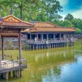 Tu Duc Tomb tours with the lakeside wooden pavilion inside the Hue royal complex