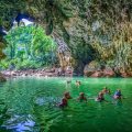 Swimming inside Tu Lan Cave
