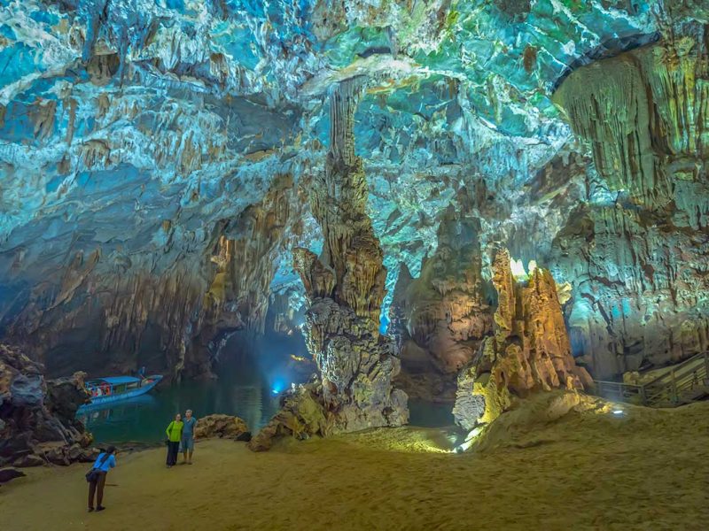 Vietnam adventure holidays exploring caves in Phong Nha, showcasing underground adventure experiences as part of complete Vietnam travel packages