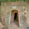 Vinh Moc Tunnel tours visiting the narrow underground entrances used during the Vietnam War